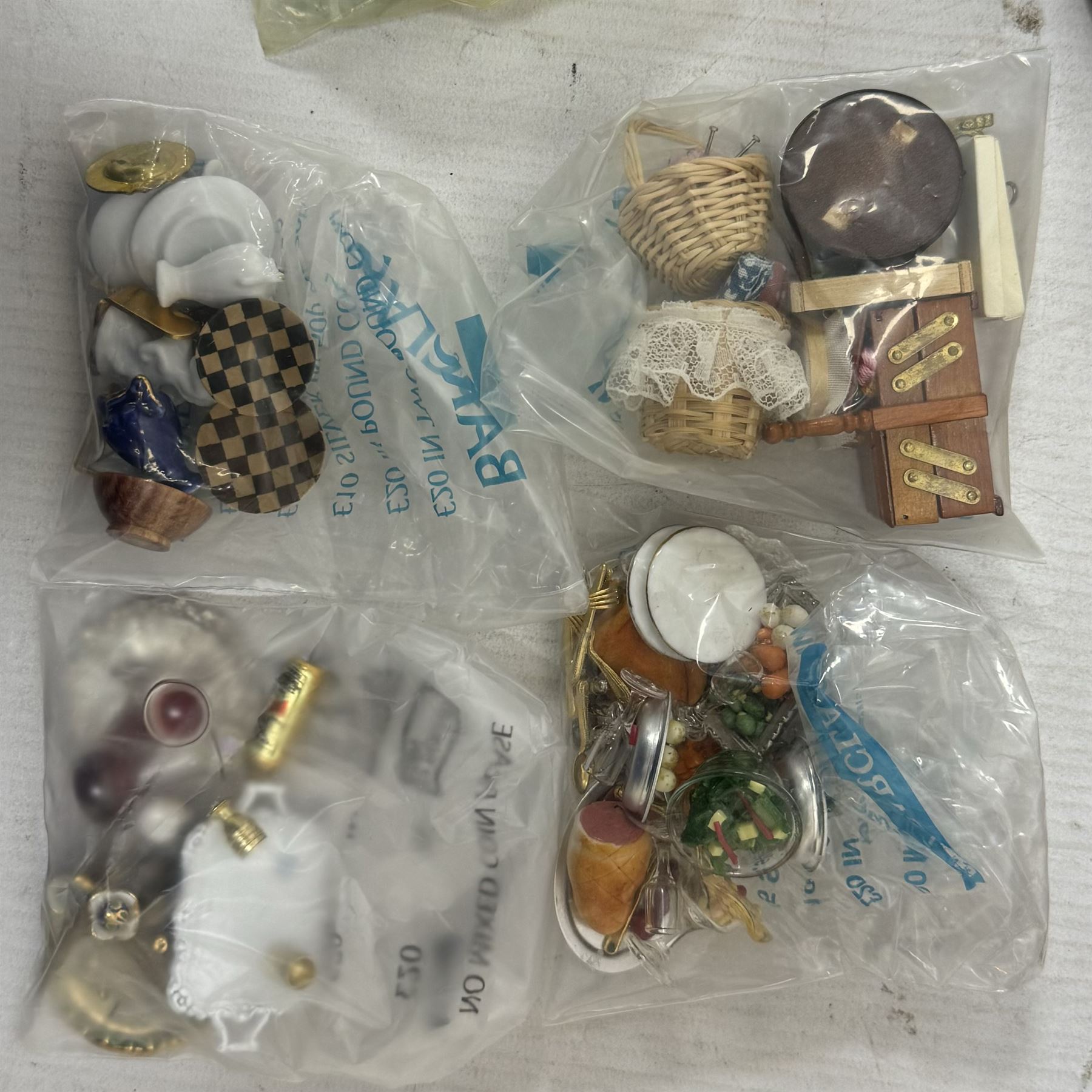 1:12 scale dolls house hallway and dining room furniture, including hat stand, mannequin, dressers and cabinets with ceramic ornaments, rocking chair, dining table, side board, dresser, drinks trolley, sewing machine, dining accessories and food, etc