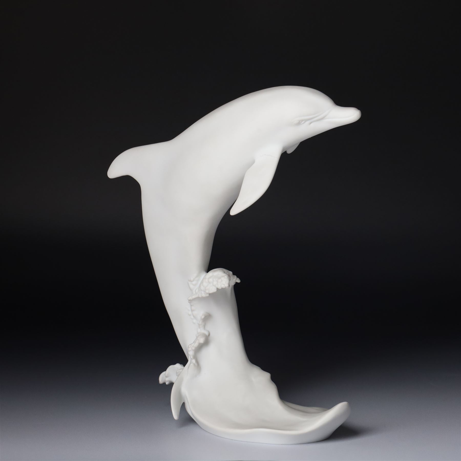 Glassware including Mats Jonasson Signature Collection dolphin sculpture, Swarovski 1990 Annual Edition dolphin model 'Lead Me', two Caithness vases, Caithness 'Christmas Tree' paperweight, Bohemia glass large dolphin model and wine glass with etched decoration, six boxed
