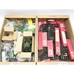 Hornby Dublo/Hornby - quantity of layout and trackside accessories including trees and bushes, lichen, cork ballast, hoarding, quarry granite, fencing, boxed Merit items, Tri-ang huts, farm animals etc; and quantity of two-rail track, points, decouplers etc, some boxed