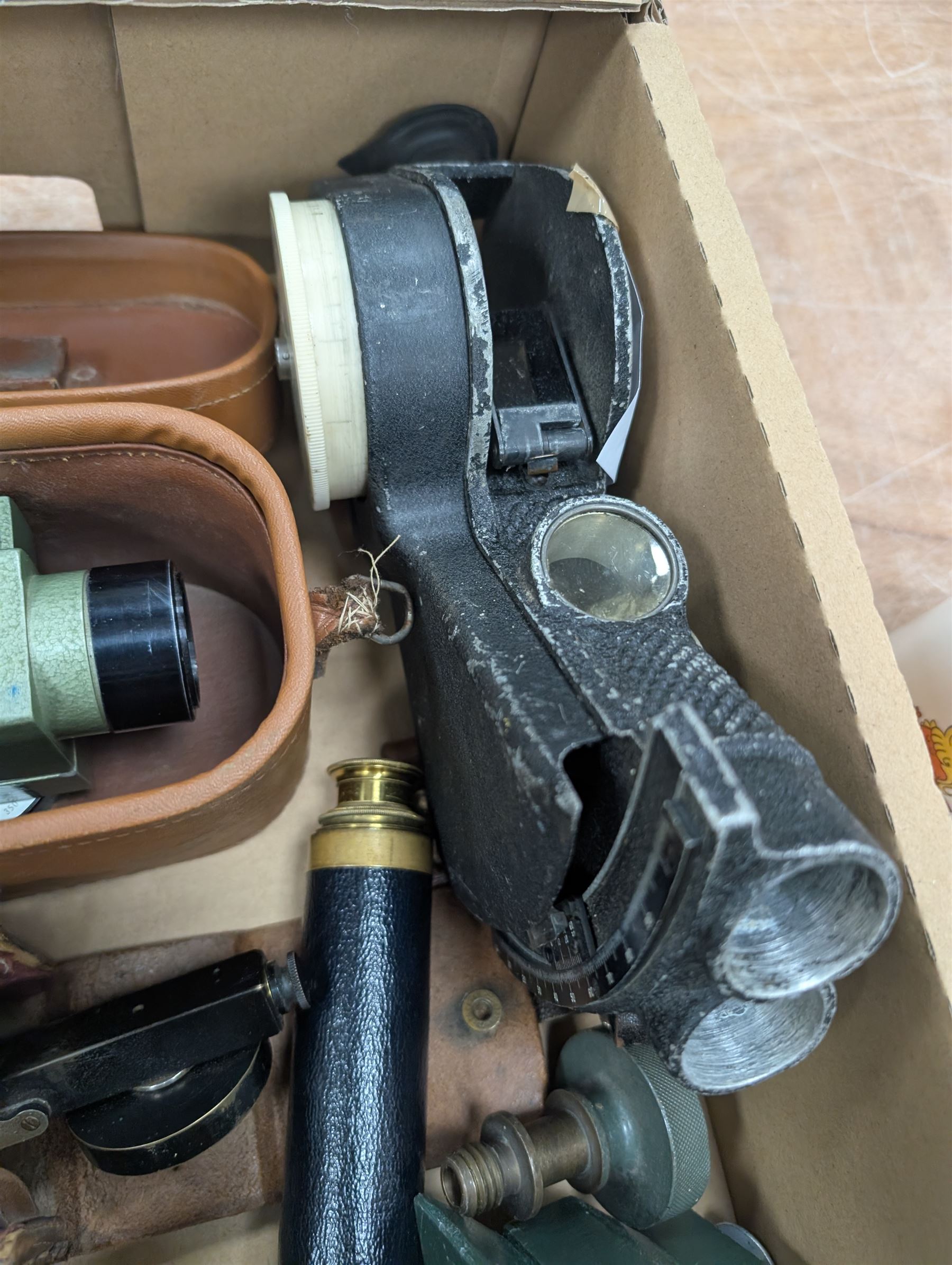 Two dumpy levels including Watts & Son ltd example and a Vickers Instruments example, US Navy bubble sextant, GT Price torch stamped US MX 991/U, 'The Unique' slide rule, three draw telescope and other instruments