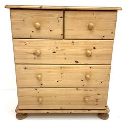 Solid pine chest, two short and three long drawers, turned supports 
