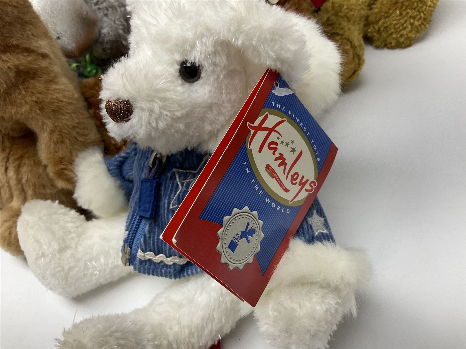 Eighteen Russ teddy bears including Ariella, Chloe, Spencer and Desmond,  mostly with tags, together with six other soft toys, tallest H42cm (24)