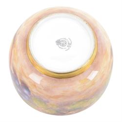 20th century Royal Worcester footed bowl, hand painted with gilt interior, the exterior a still life of fruit upon a mossy ground, signed Freeman, with black printed mark beneath, together with plate side plate and cabinet plate, bowl, H8cm, D13cm