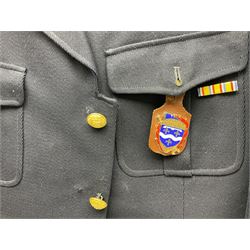 Mid 20th century French Ugeco Nantes first class dress navy blue uniform with ribbon bar with cap, and quantity of Sapeurs Pompiers patches, Sapeurs Pompiers de Caen belt buckle etc