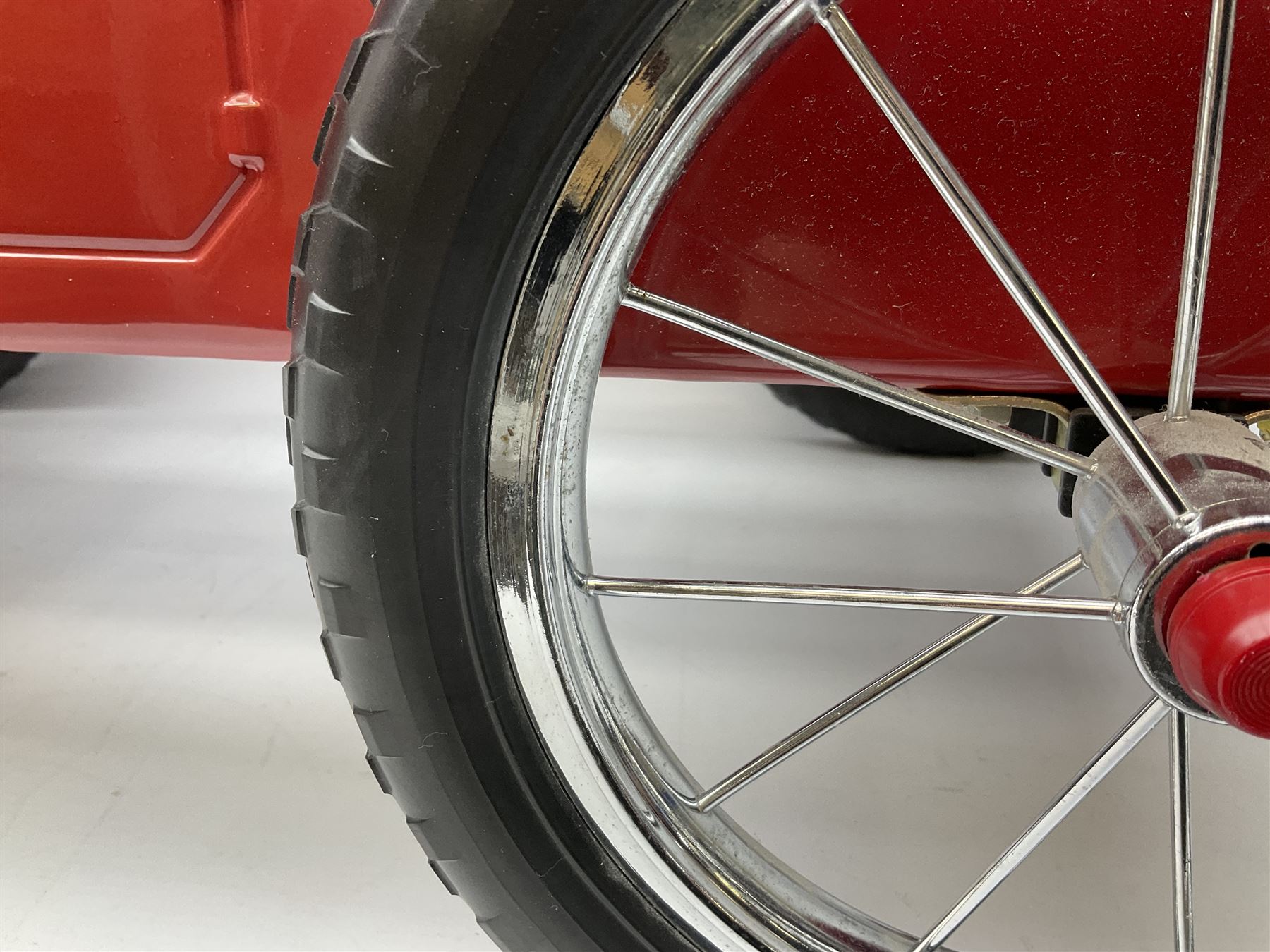 Red child's tin-plate pedal car with chrome detail, by Posh Paddles, Scarborough, H56cm, L80cm