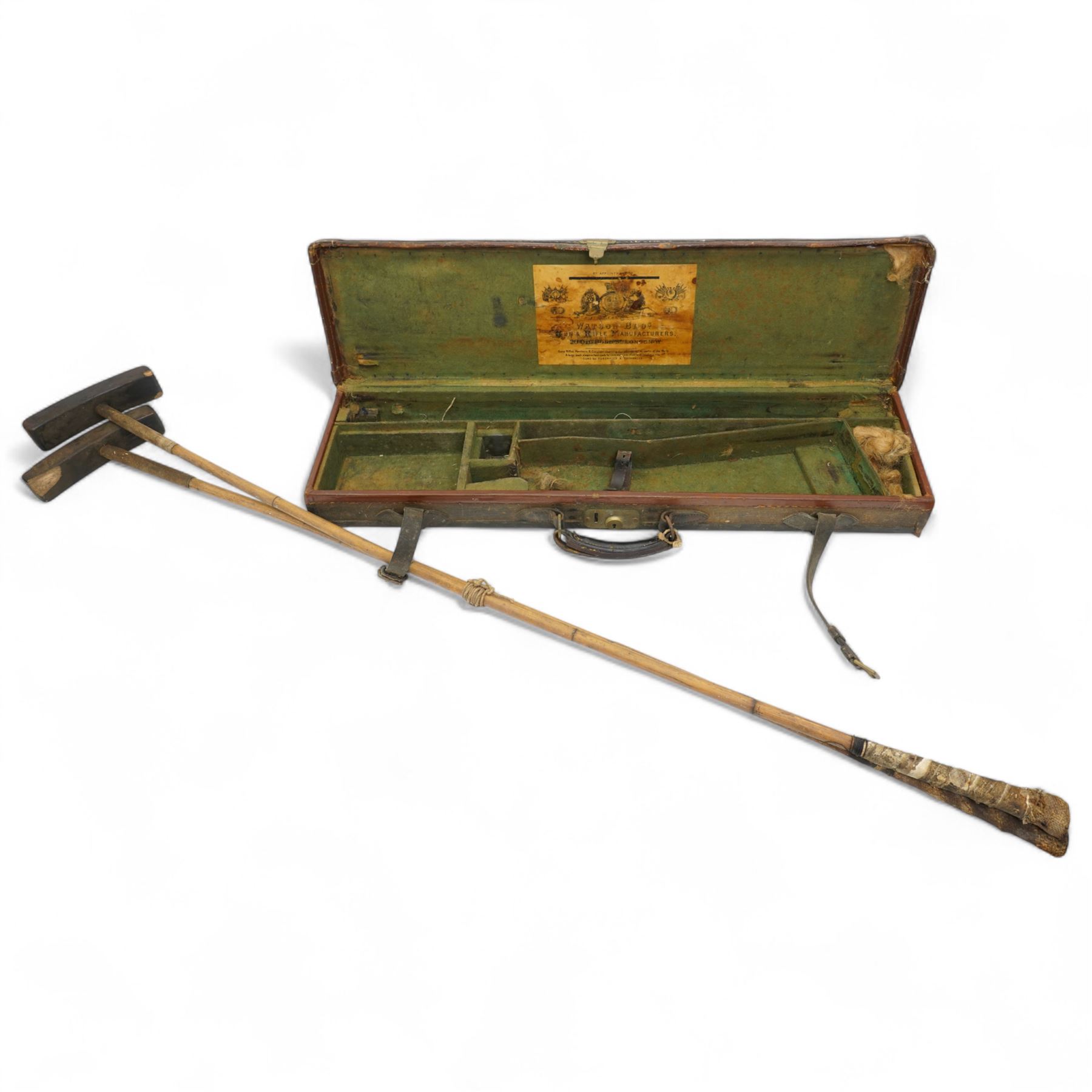 Canvas and leather trimmed shotgun case by Watson Bros., London inscribed G.H.N.Todd, Royal Scots Greys  and two Polo mallets, probably Indian