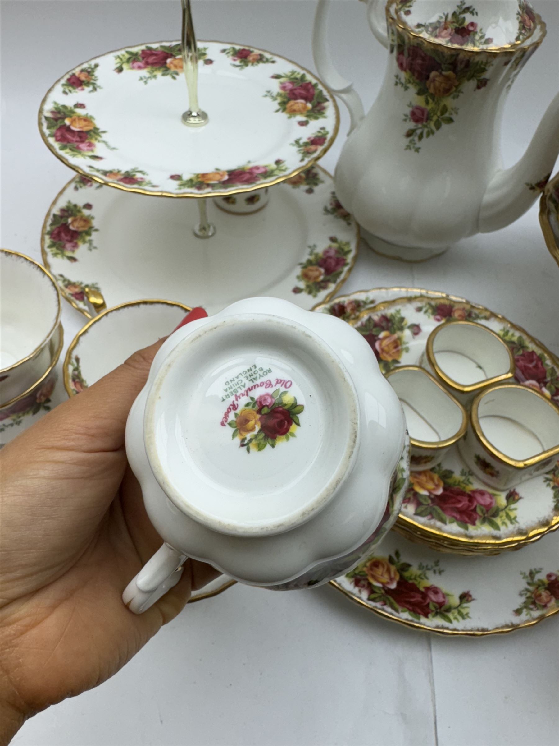 Royal Albert Old Country Roses pattern tea wares, comprising coffee pot, jug and sugar bowl, cake stands, napkin rings, teacups and saucers, side plates, dessert plates, small plates, all with printed marks beneath