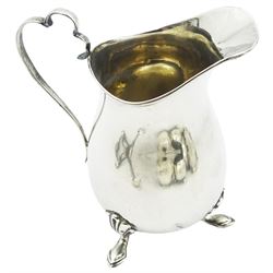 Group of assorted silver, to include early 20th century cream jug, of bellied form with with scroll top handle, upon three pad feet, hallmarked J & R Griffin, Chester 1918, pair of Victorian open salts of cauldron form, upon three ball feet, hallmarked Atkin Brothers, Sheffield 1860, a modern silver handled Bead Edge pattern cake knife, hallmarked United Cutlers Ltd, Sheffield 1993, a 20th century silver pepper, modern silver open salt, George III Fiddle pattern salt spoon, William IV Fiddle pattern salt spoon, pair of Victorian Bead Edge pattern salt spoons, etc., approximate total weighable silver, 9.13 ozt (284 grams)