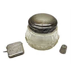 1920's century silver toped cut glass dressing table jar, hallmarked London 1921, together with a Victorian silver thimble, hallmarked Birmingham 1898, and a silver plated vesta case, (3)