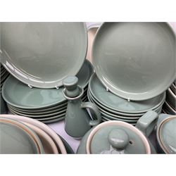 Denby Manor Green pattern part tea and dinner service, to include seven dinner plates, thirteen side plates, ten dessert plates, two oval dishes of various sizes, four cups and saucers, seven bowls with covers, two teapots etc (74)  