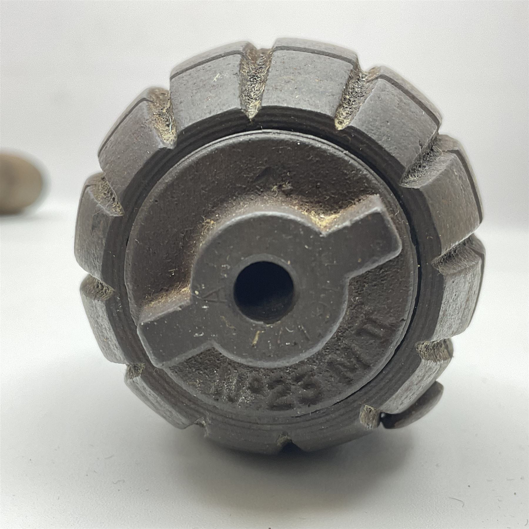WW1 practice Mills bomb stamped 'A.L. & Co 1917 No.23 Mk.II' H10cm; and reproduction WW2 German stick grenade (2)