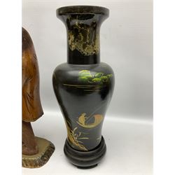 Pair of Japanese vases of baluster form decorated with koi fish and fishing village scene with gilt, the neck and rim with marble effect decoration, raised upon circular plinth bases, together with a carved wood figural candlestick of a monkey butler style figure with brass base, tallest H48cm