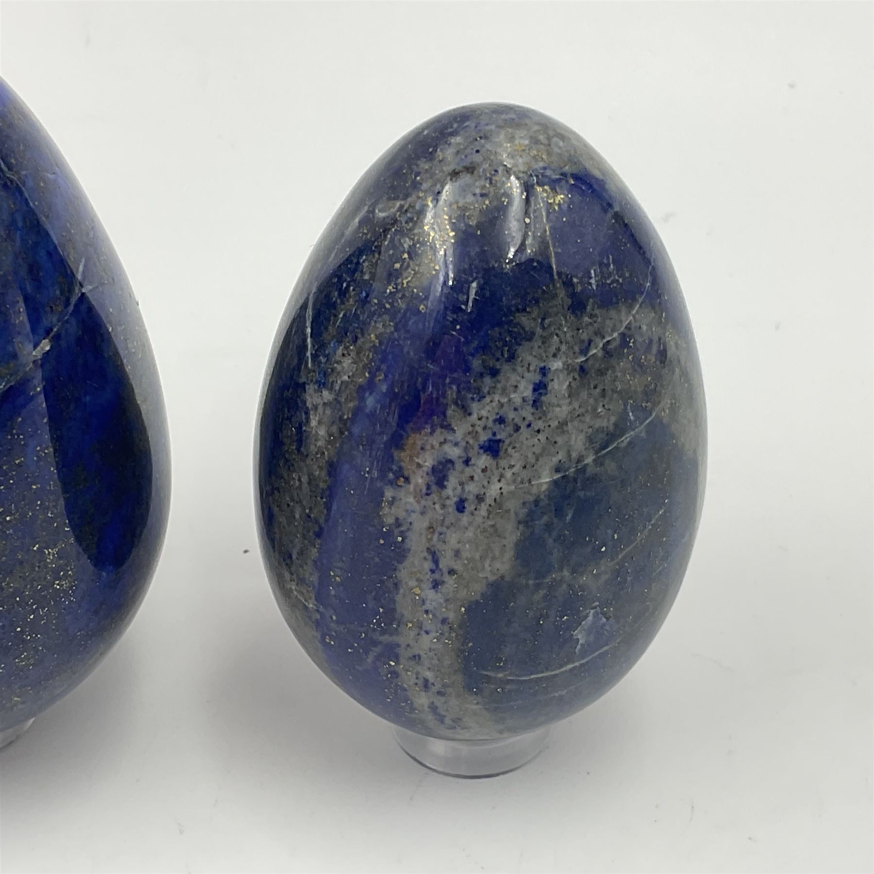 Collection of five Lapis lazuli specimen eggs, largest egg H7cm