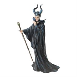 Disney Showcase Haute Couture figures, comprising Evil Queen, Cruella Devil and two Malificent, all boxed