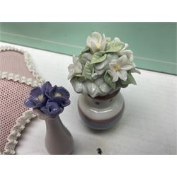 Seven Lladro flowers, comprising Japanese Camelia on base no 5181, Yellow Begonia on base no 5186, Miniature Begonia on base no 5188, Chrysanthemum on base no 5189, California Poppy no 5190.B, Miniature Begonia 5188.B and White Carnation no 5184.B, together with Lladro Spanish Joining pack with 17616 Winter Bell, Additional Lladro parasols and flowers etc 