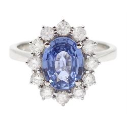 18ct white gold oval Ceylon sapphire and diamond cluster ring, stamped 750, sapphire approx 1.65 carat, total diamond weight approx 0.60 carat