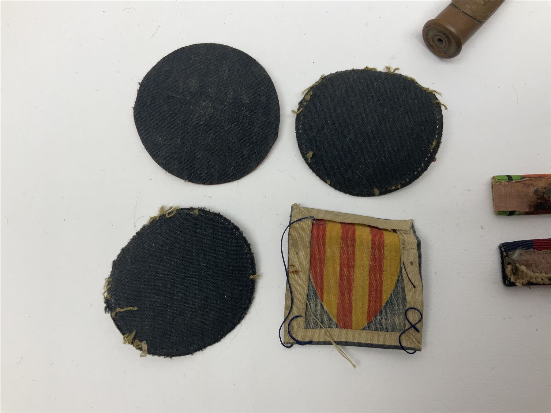 WW1 Short & Mason Ltd 'The Magnapole' black japanned brass field compass in leather carrying case; WW1 trench art paper knife inscribed Dixmude; and small quantity of cloth badges etc