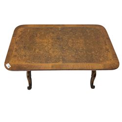 19th century and later stretcher coffee table, the rectangular top with figured and quarter walnut veneer, on two pillar supports joined by turned and carved stretcher, on splayed and scroll carved supports