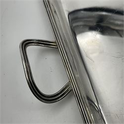 Small early 20th century silver tray, of rectangular form with reeded edge and twin reeded handles, hallmarked Asprey & Co Ltd, London 1914, including handles W26.5cm