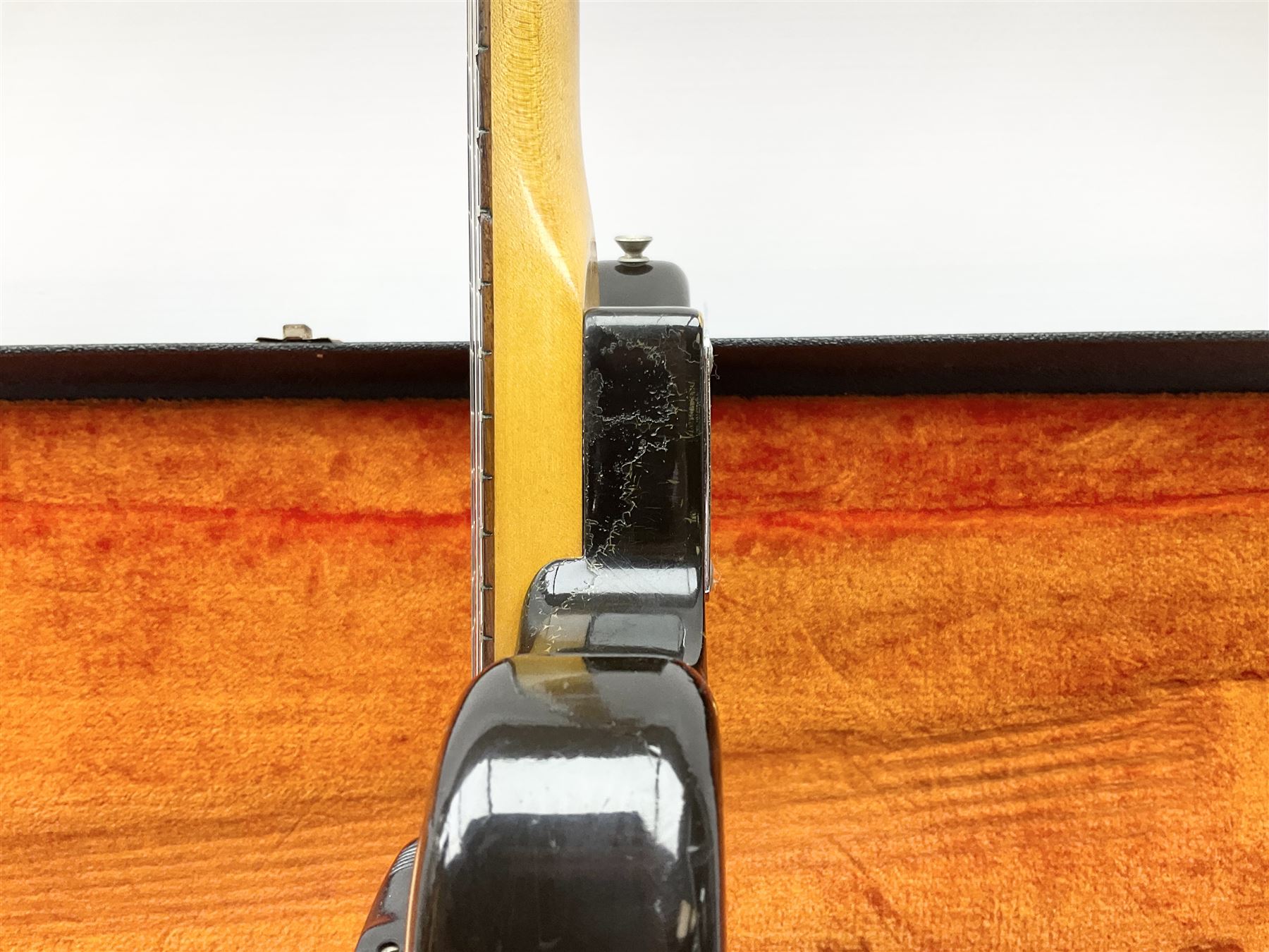 Fender three-tone Sunburst 12-string electric guitar c1965/6 Fullerton USA, with alder body and maple neck, the Indian rosewood fretboard with twenty-one frets and pearloid dot markers, fender electric XII bridge, F-stamp tuners (non-original), two split single coil pick-ups, master volume and tone and four-way switch, serial no.129730, L108cm; in original Fender case bearing label for Rivington Guitars New York with copy of original invoice; together with GuitarKes set-up and service certificate dated October 2021
