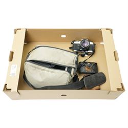 Kodak vest Pocket Hawk-Eye camera, Minolta X-300 camera, Tokina lens and other items