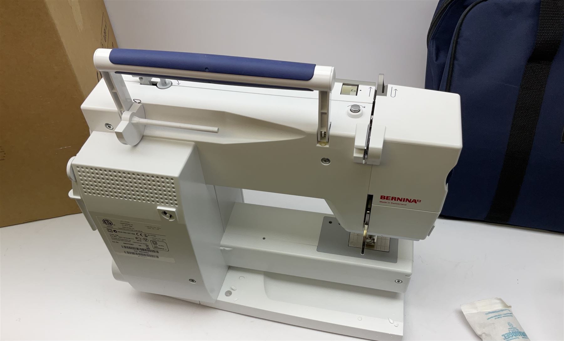 Bernina 'Artista' 630 computerised sewing machine with stitch regulator, carrying case, instruction booklet and accessories, in original box