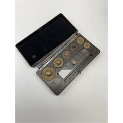 Set of laboratory balance scales by Paul Bunge Hamburg Model 9A No.7977 bearing label for Reynolds & Branson Leeds in mahogany case with upward sliding front door, two hinged side doors, hand cranked rise-and-fall facility and black vitrolite base L36cm H42cm D26cm; and two boxed part sets of weights (3)