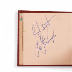 1950s autograph book, containing mostly motorcycle racing signatures, including four-time World Sidecar Champion Eric Oliver, 1952 Sidecar World Champion Cyril Smith and1955 Junior TT Champion Jack Bailey, in red leather case with gilt lettering 