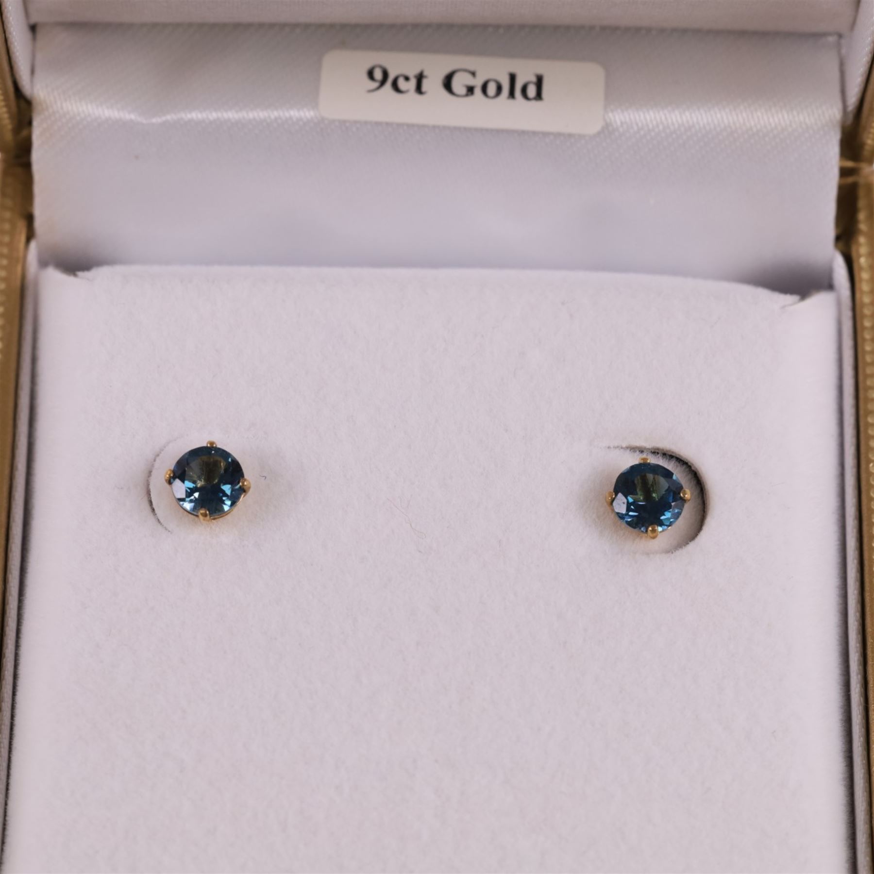 Pair of 9ct gold London blue topaz stud earrings, boxed, D5mm