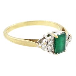 9ct gold emerald and diamond ring, single octagonal cut emerald of approx 0.45 carat, set between brilliant cut diamond trefoil shoulders
