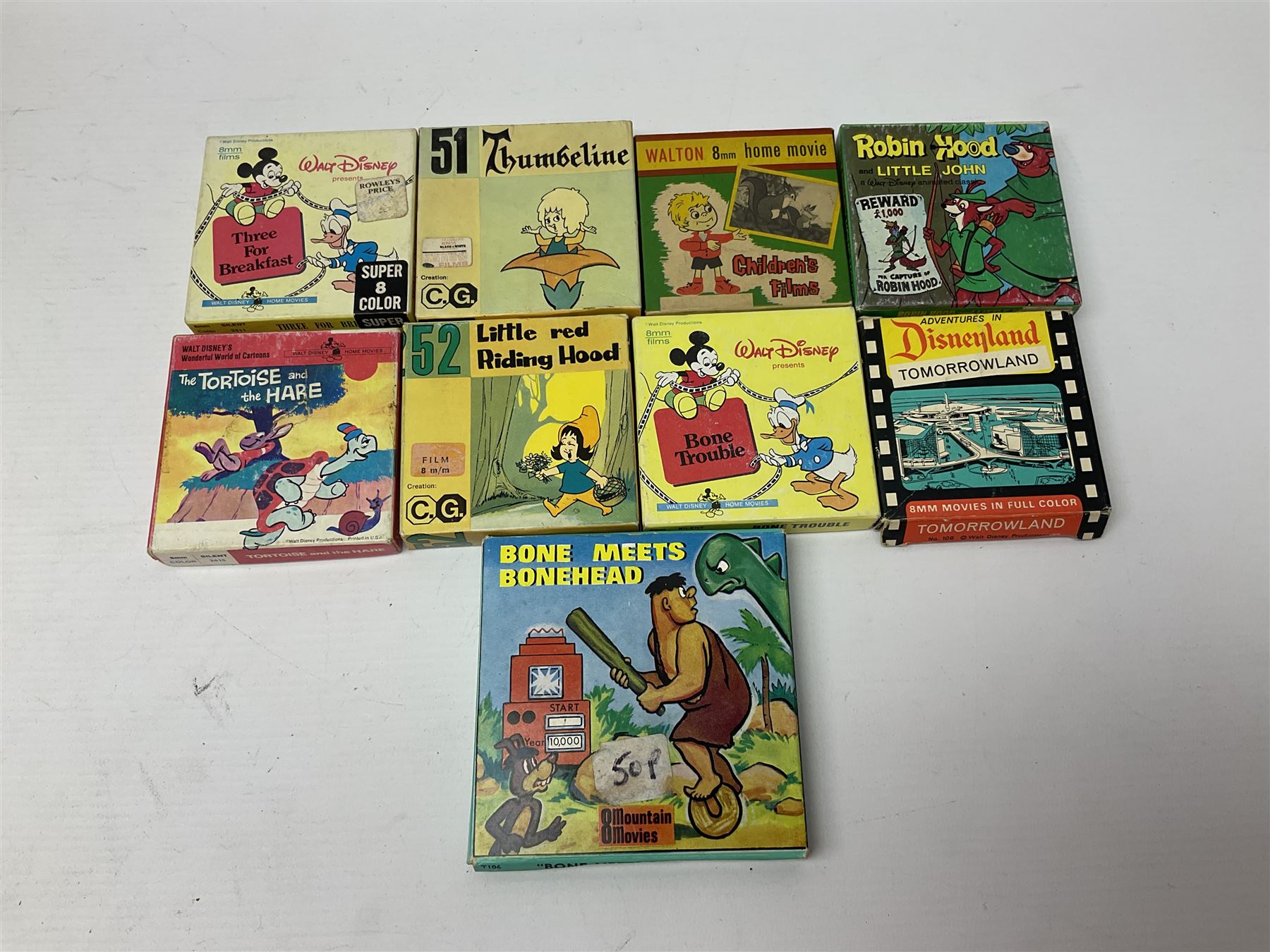 Corgi/Disney - Movie Vision, in original box, with Corgi projector, two Corgi Movie Viewers and nine films; together with 8mm film reels and strips to include Disney’s Dumbo, Mickey Mouse, Alice in Wonderland etc, most in original boxes