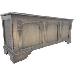 Early 20th century oak blanket chest, rectangular top over triple panel front, bracket feet