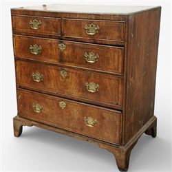 Georgian mahogany chest of drawers, the rectangular top above two short drawers over three long graduated drawers, each with brass swan neck handles and escutcheons, raised on shaped bracket feet