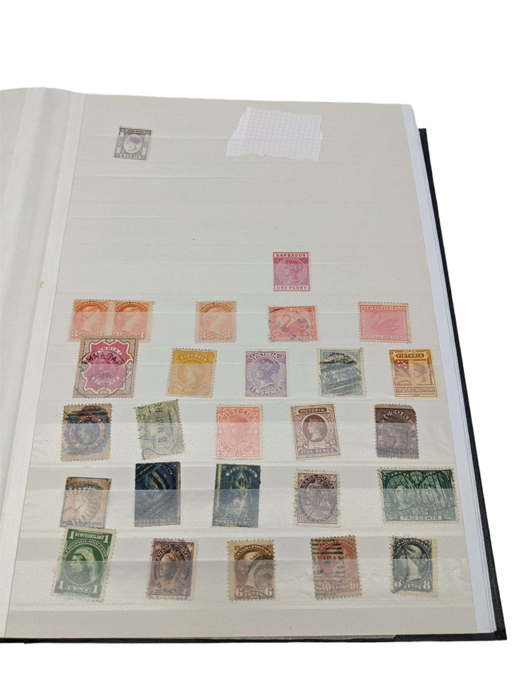 World Stamps including Seychelles, Southern Rhodesia, Sudan, Cyprus, Bermuda, Queen Victoria Canada, King Edward VII Straits Settlements etc, mixture of mint and used values, housed in a black stockbook