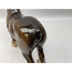 Three Beswick models comprising Hereford Bull no 949, 'CH Cutmil Cupie' Pug, and bay Shire horse, all with printed marks beneath