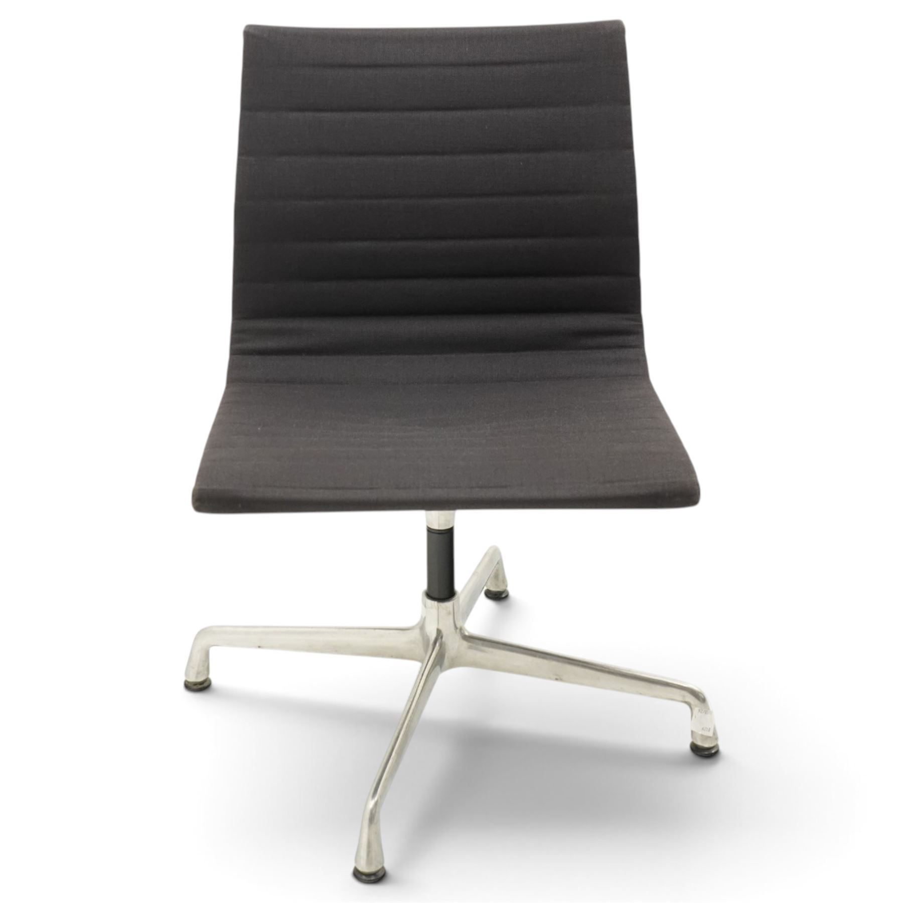 Charles and Ray Eames for Vitra - EA 105 chrome swivel chair upholstered in navy blue, raised on a four point chrome base