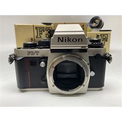 Nikon F3T camera body, in champagne/ titanium colourway, serial no. T8215031, with 'Nikon Nikkor 50mm 1:1.4' lens, Nikon MD4 motor drive, serial no. 156592 and Nikon MK-1 Firing range converter, all with original boxes 