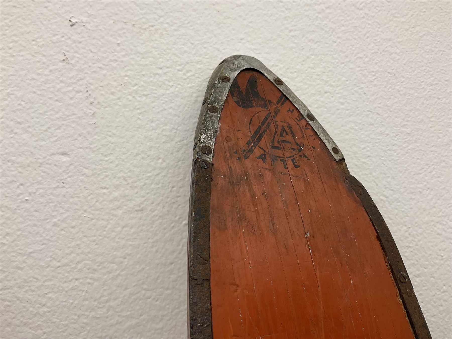 Pair of 1930s wooden skis, with painted metal runners beneath stamped Attenhofer, with retailers label for Ernst Gertsch Central Sports, L206cm