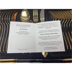 Bestecke Solingen canteen of gold plated cutlery for twelve place settings, including ladle, cake slice and serving spoons, contained within a briefcase, together with a matching set twelve of Bestecke Solingen gold plated fish knives and forks, in fitted case 