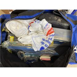 Collection of adult wet suits and diving equipment, including Atlantic 90L diving bag, a selection of diving fins in various sizes, diving masks and snorkels and boots,  IST Sports dry suit medium, O'Neil wet suit extra large, two Tiki wet suits medium and small , Warmbac wet suit, size 34 and Rip Curl wet suit extra small.  