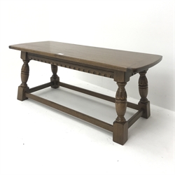 Rectangular oak joint style coffee table, cup and cover supports joined by stretchers, W106cm, H43cm, D43cm 