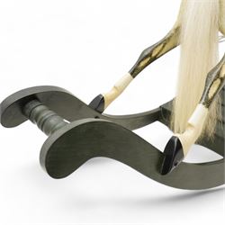 In the manner of F. H. Ayres - large carved wooden rocking horse, in dapple grey paint finish, decorated with glass eyes, leather reins, stirrup and saddle, on bowed rockers united by turned stretchers and boarded base 