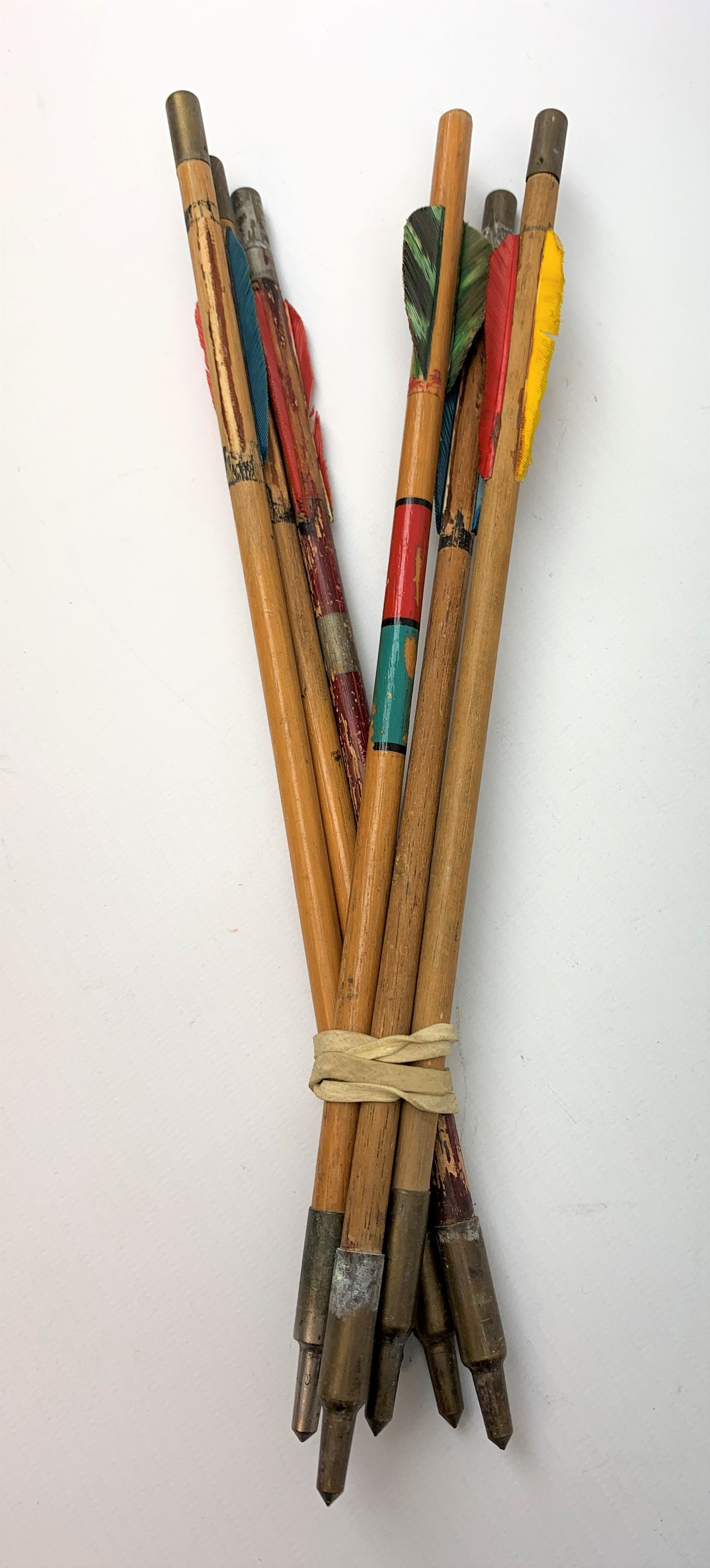 20th century crossbow with sectional mahogany shaped stock and Nikko Stirling telescopic sight L89cm; together with another similar with hinged foresight; and six arrows (8)