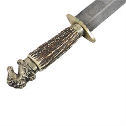 Fred W James Sheffield bowie knife, the 24cm blade engraved 'The United States the Land of the Free and the Home of the Brave..', stag handle, pommel in the form of a horse's head, with leather sheath, L42cm
The pommel motif is a classic bowie fitting, the book Tweedale, G: The Sheffield Knife book has an illustrated example on p87