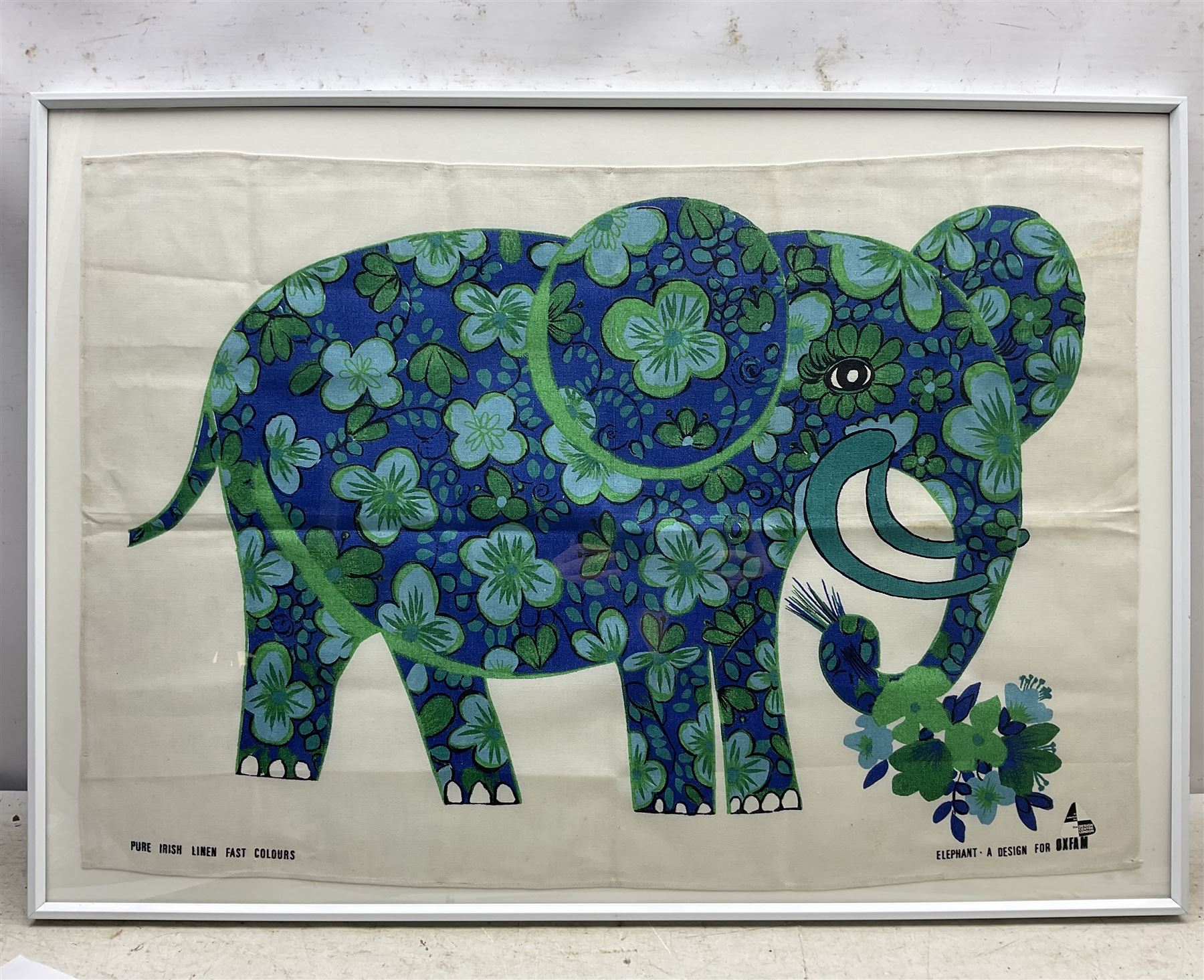 Belinda Lyon (British 20th Century) for Oxfam: 'Elephant', framed tea towel 54cm x 78cm 