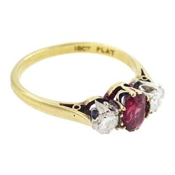 Gold three stone oval cut ruby and round cut diamond ring, stamped 18ct Plat, ruby approx 0.65 carat, total diamond weight approx 0.30 carat