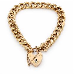 Early 20th century gold curb link chain bracelet with heart padlock clasp, by  W.H. Wilmot...