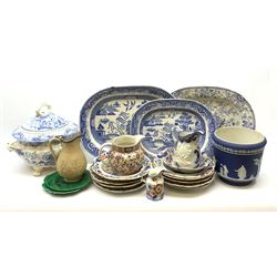 A collection of 19th century ceramics, to include an Adams Jasperware planter, decorated with a classical figural band upon a dark blue ground, D21cm, large blue and white tureen and cover, with twin handles and raised upon four paw feet, marked beneath Royal Persian, possibly Minton, nine Masons Ironstone Imari pattern plates, D26cm, Wedgwood cabbage leaf plate, another unmarked example, Imari pattern shell dessert dish, three blue and white platters, etc. 