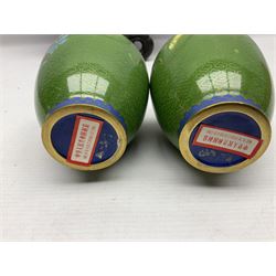 Cloisonné plate decorated with birds and flowers, together with a pair of Cloisonné vases of baluster form 