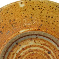 David Lloyd Jones (1928-1994); covered coffee pot and shallow bowl, each with speckled glaze, the bowl decorated with a pink flower, coffee pot H17cm 